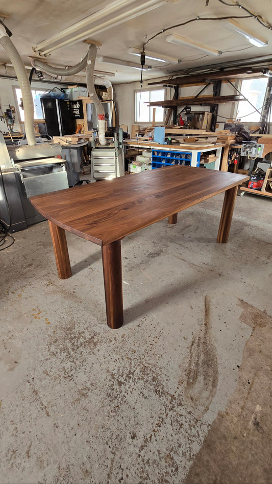 Pillars walnut dining table