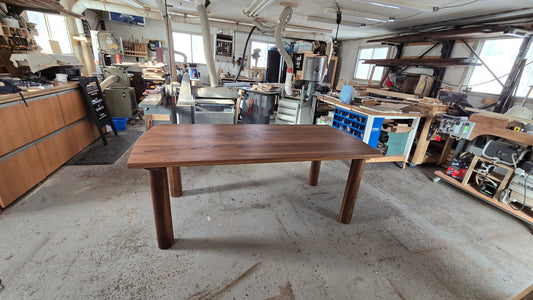 Pillars walnut dining table