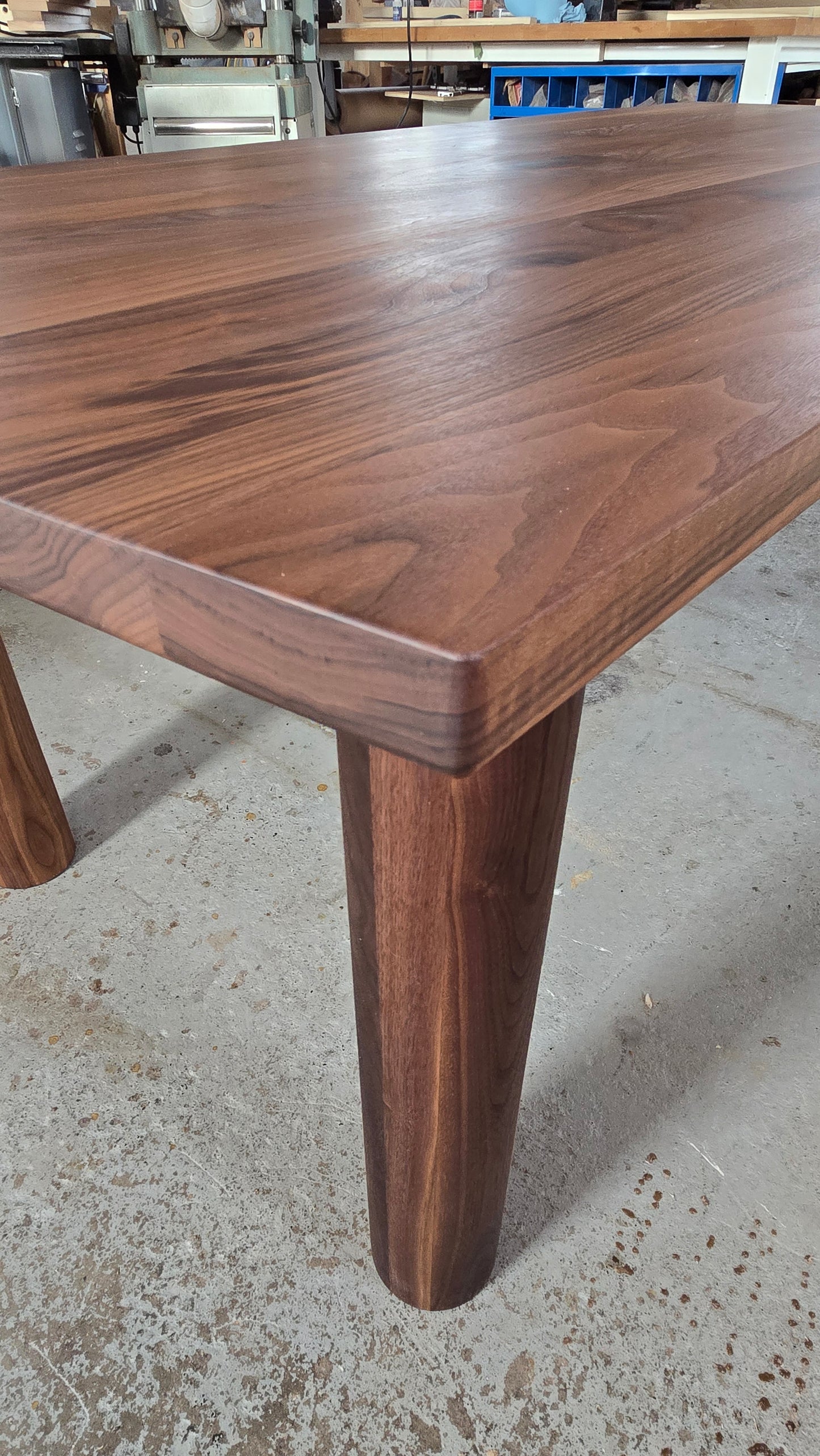 Pillars walnut dining table