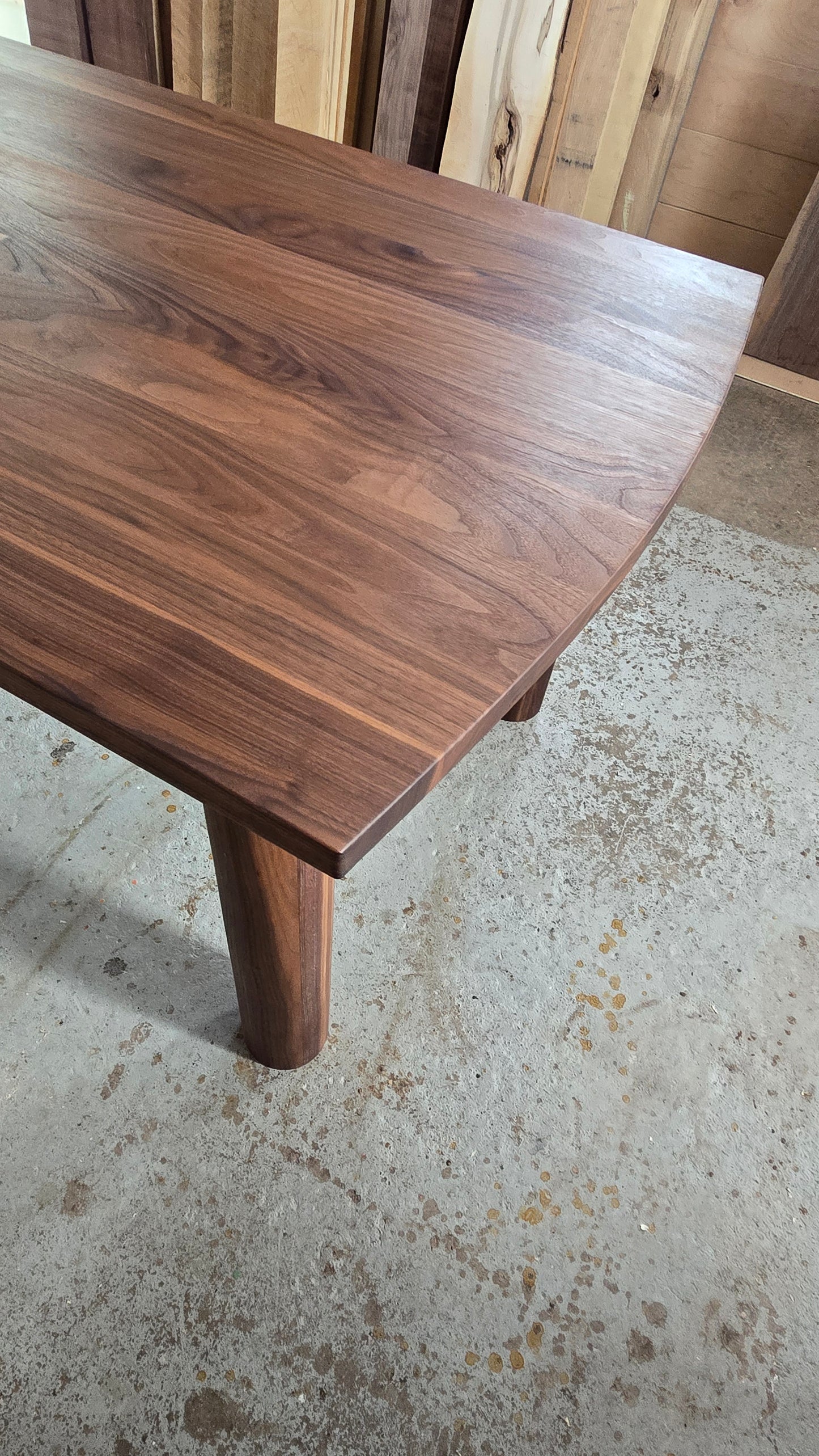 Pillars walnut dining table