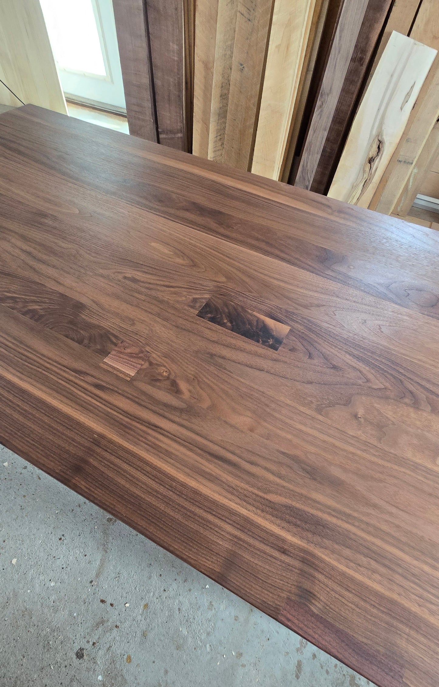 Pillars walnut dining table