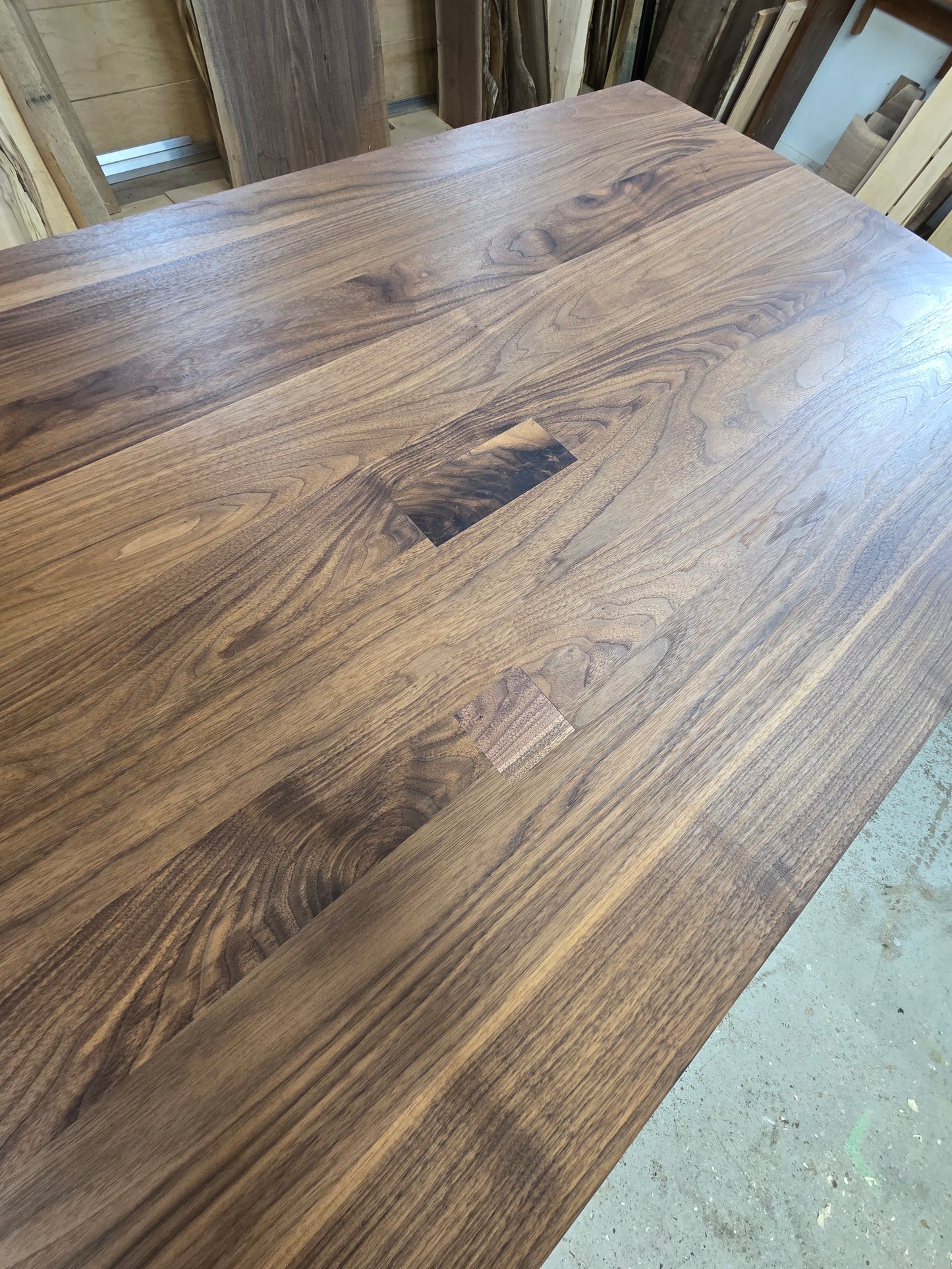 Pillars walnut dining table