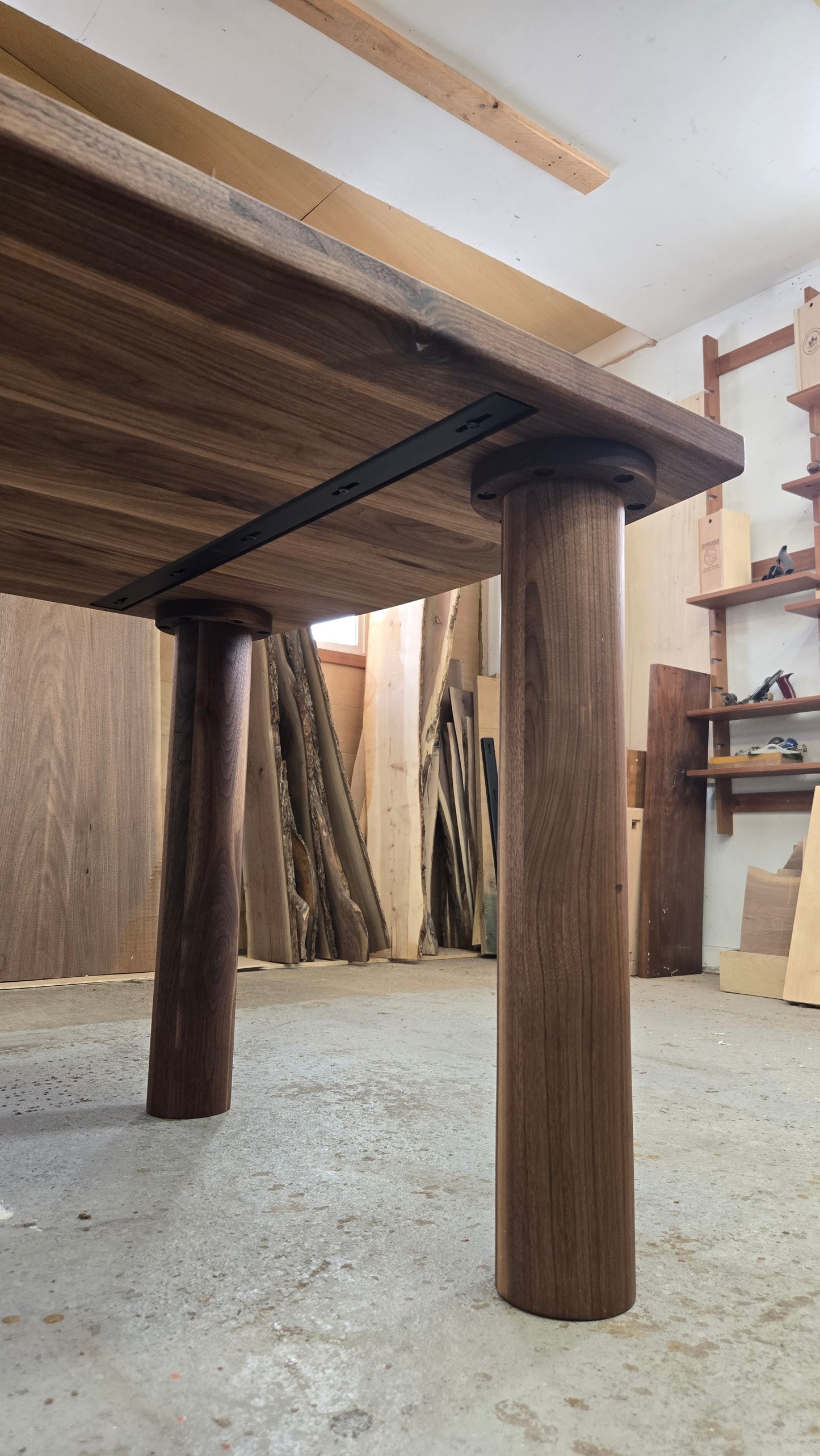Pillars walnut dining table